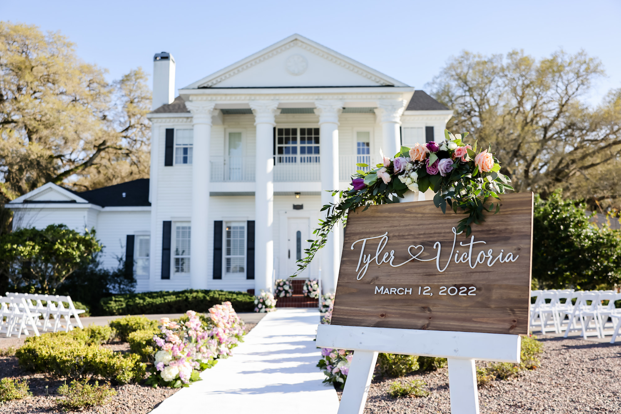Rustic Wooden Wedding Sign Inspiration | Southern Venue Private Wedding Estate Ceremony Inspiration | Brooksville Wedding Venue Legacy Lane Weddings | Garden Folding Chairs