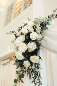White and Blue Roses, Hydrangeas, Ruscus, and Eucalyptus Floral Arch Decor
