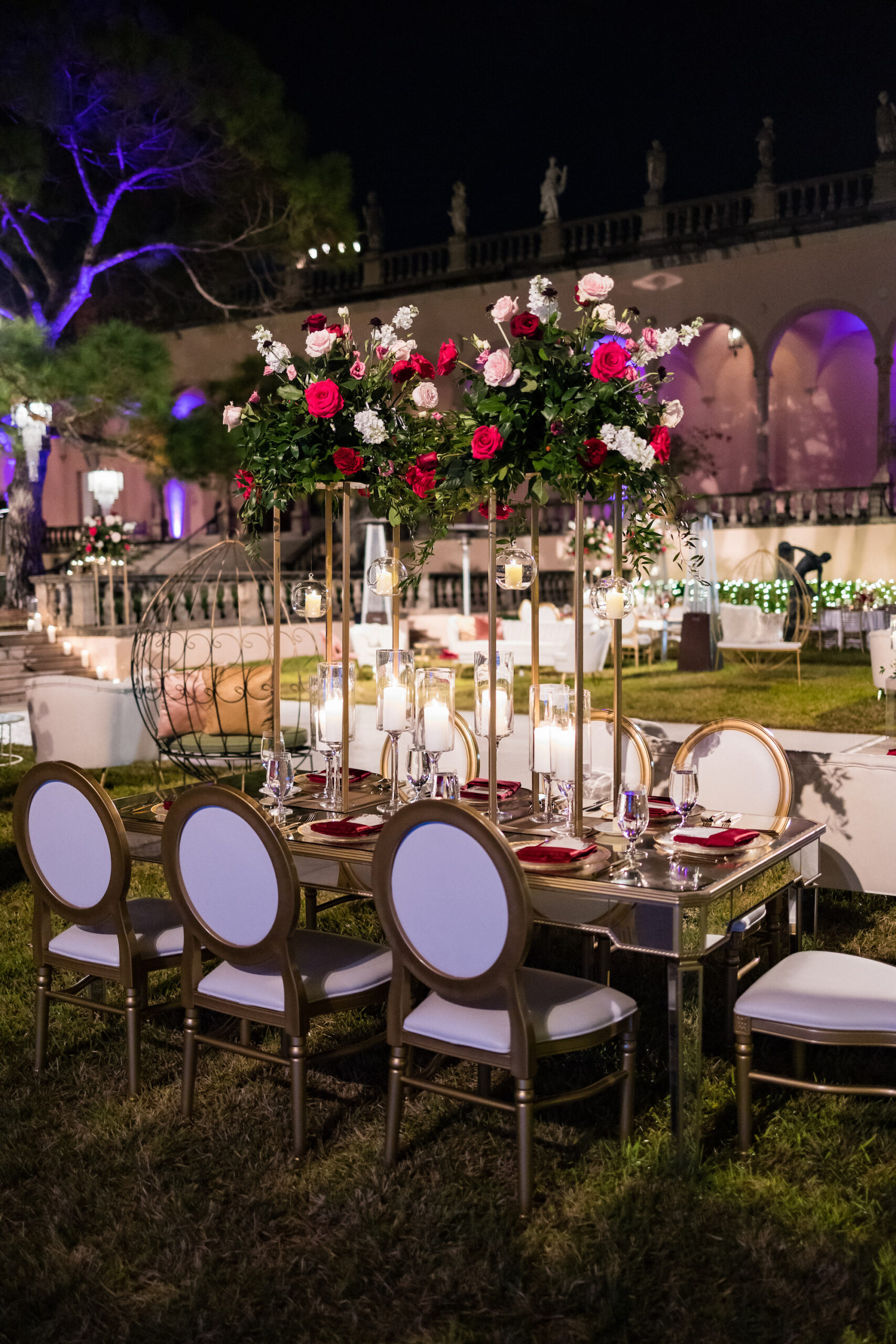 Luxurious Modern Outdoor Evening Courtyard Wedding Reception Inspiration with Tall Centerpiece and White and Gold Charis | Sarasota Wedding Venue The Ringling Museum | Florist FH Events