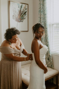 Bride Getting Ready Portrait | Button Back Strapless Wedding Dress | Champagne Gold Mother of the Bride Dress | Tampa Bay Boutique Truly Forever Bridal