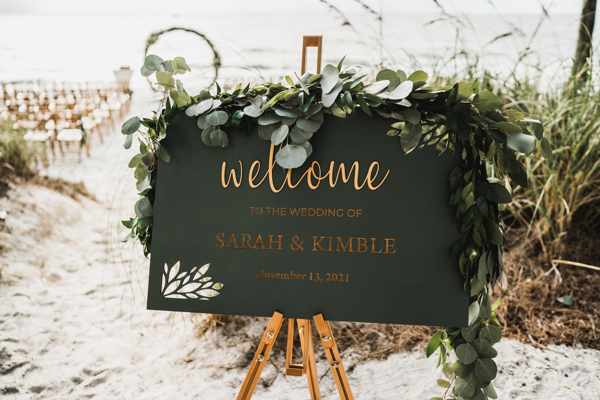 Black and Gold Welcome Wedding Sign with Cascading Eucalyptus Greenery Ceremony Decor Ideas