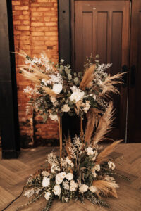 Boho Wedding Ceremony Altar Floral Arrangement Ideas | Fern, White Roses, Eucalyptus, Pampas Grass | Tall Gold Flower Stand