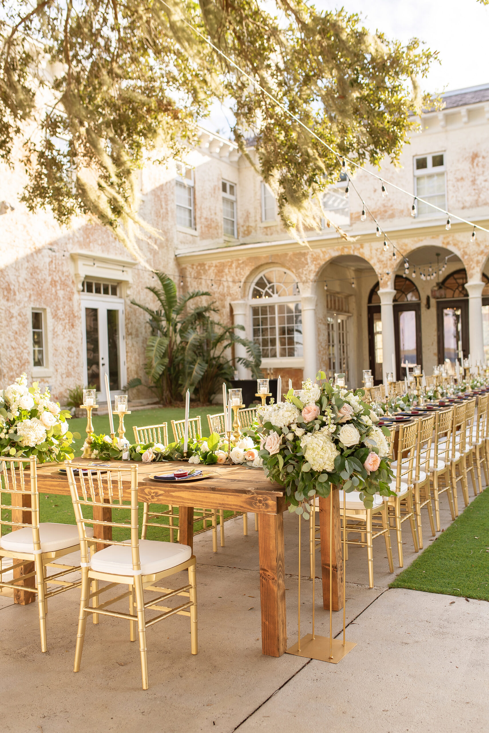 Italian-Inspired Wedding Decor Inspiration | Long Feasting Table for Intimate Wedding Reception | Gold Chiavari Chairs with Cushion | Cascading Rose and Eucalyptus Greenery Centerpiece Ideas | Tampa Bay Wedding Photographer Kristen Marie Photography | Central Florida Venue Bella Cosa