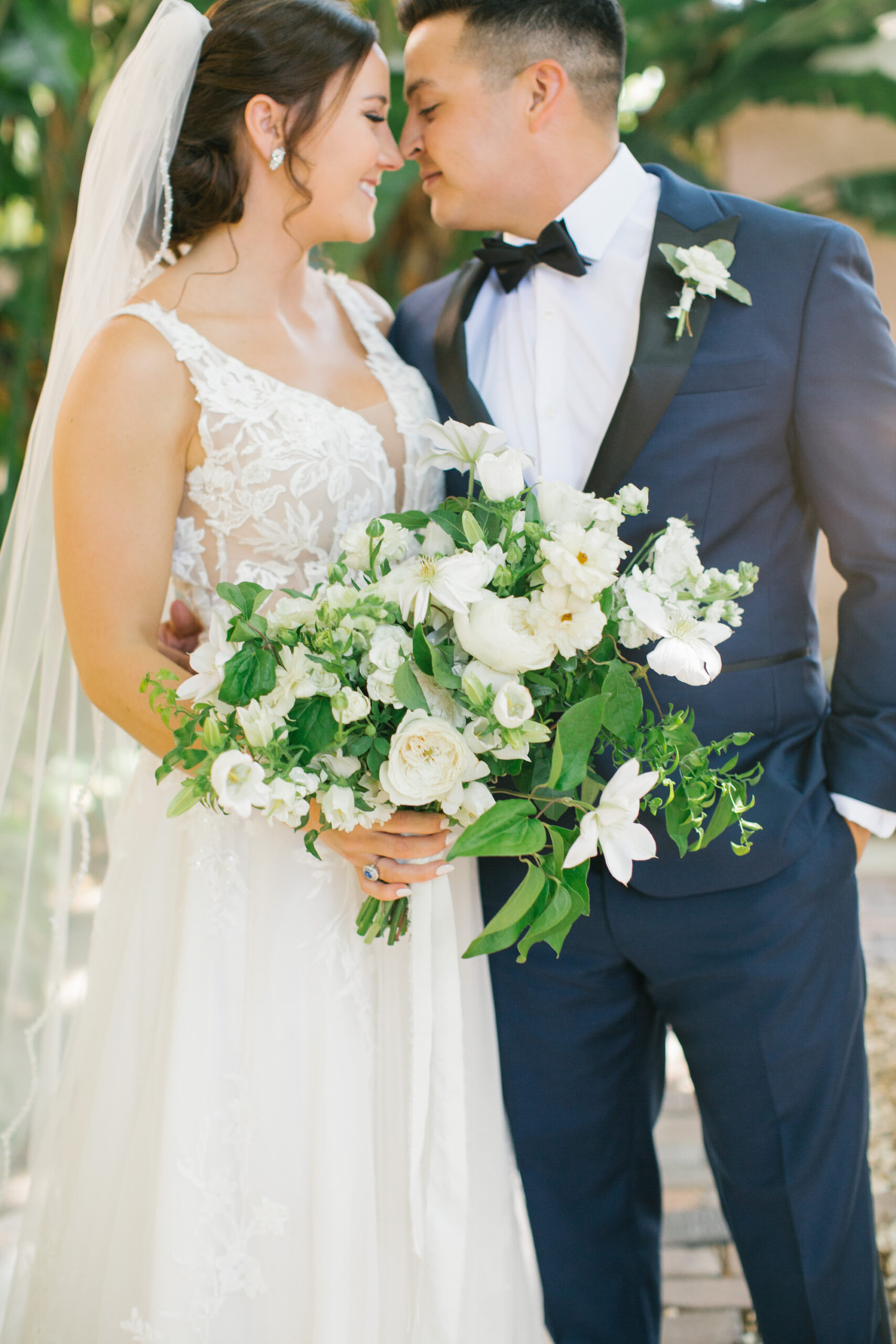 Bride and Groom Wedding Portrait | Large White Garden Rose, Orchid And Greenery Bridal Bouquet Ideas