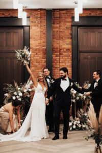 Bride and Groom Exchange Vows Wedding Portrait