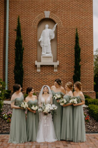 Matching Off-the-shoulder Sage Green Floor Length Tulle Bridesmaid Dress Inspiration | White Orchid and Rose with Ruscus Greenery Bridal Bouquet | Tampa Bay Florist Monarch Events and Design
