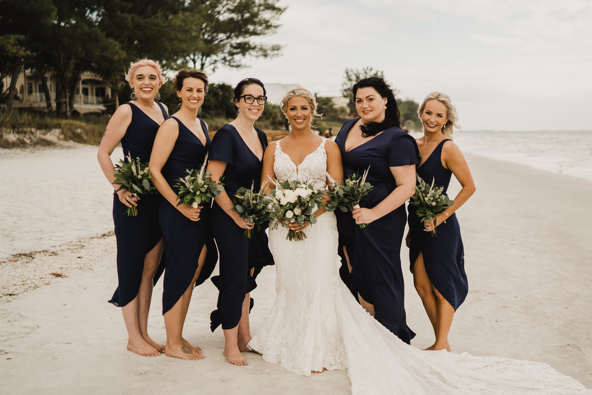 Mismatching Navy Midi Bridesmaids Wedding Dresses | Beach Wedding Inspiration | White and Greenery Bouquet Ideas Treasure Island Florist Monarch Events and Design