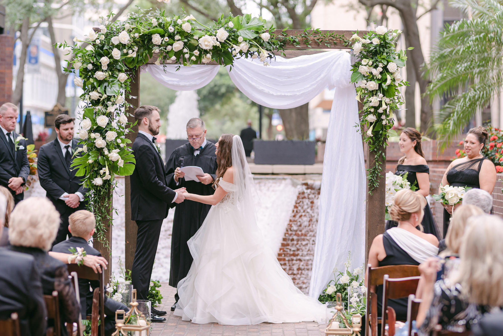 Outdoor Courtyard Ceremony with Waterfall Fountain Backdrop | Venue Hilton Tampa Downtown