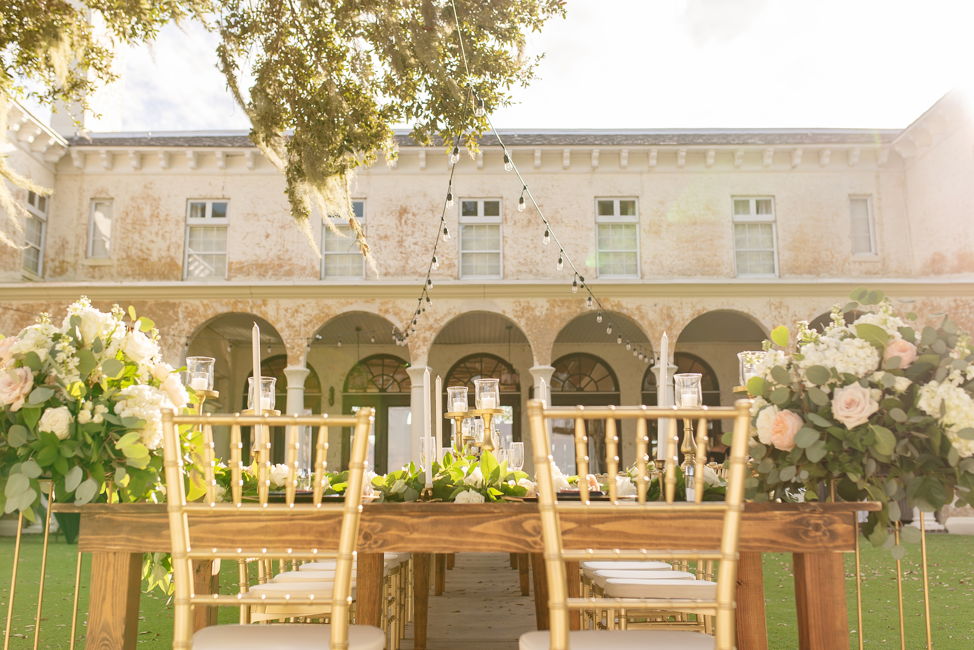 Italian-Inspired Garden Wedding Decor Inspiration | Elegant Sweetheart Table | Gold Chiavari Chair Italian Wedding Reception Inspiration | Central Florida Venue Bella Cosa