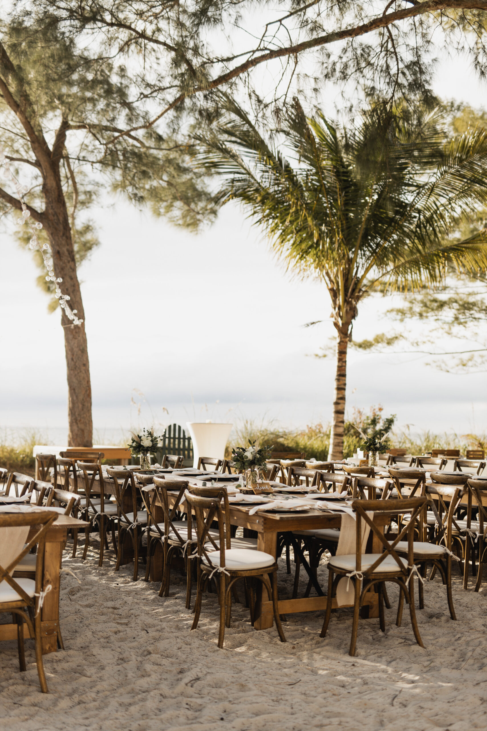 Rustic Beach Wedding Reception Ideas | Crossback Wooden Chairs | Tampa Bay Rental Gabro Event Services | Treasure Island Caterer Amici's Catered Cuisine