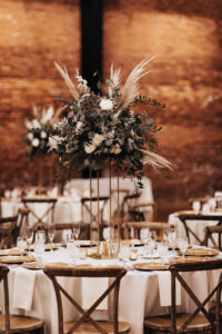 Boho Wedding Reception Centerpiece Floral Arrangement Ideas | Fern, White Roses, Eucayptus, Pampas Grass | Tall Gold Flower Stand