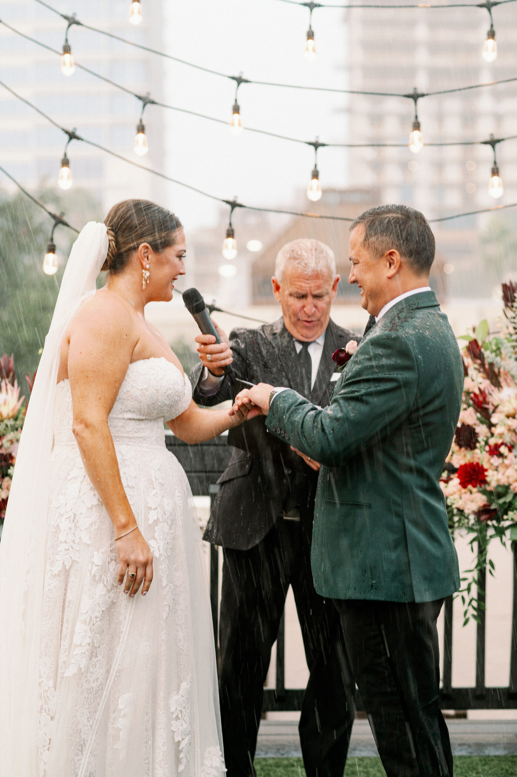 Bride and Groom Rooftop Wedding Ceremony in the Rain