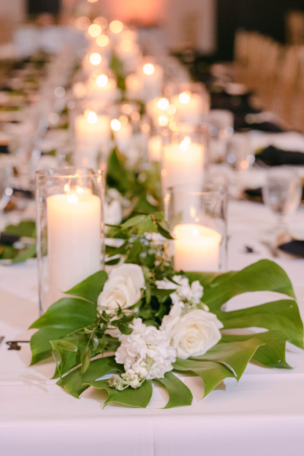 Elegant Monstera Leaf and Candle Wedding Reception Centerpiece Ideas