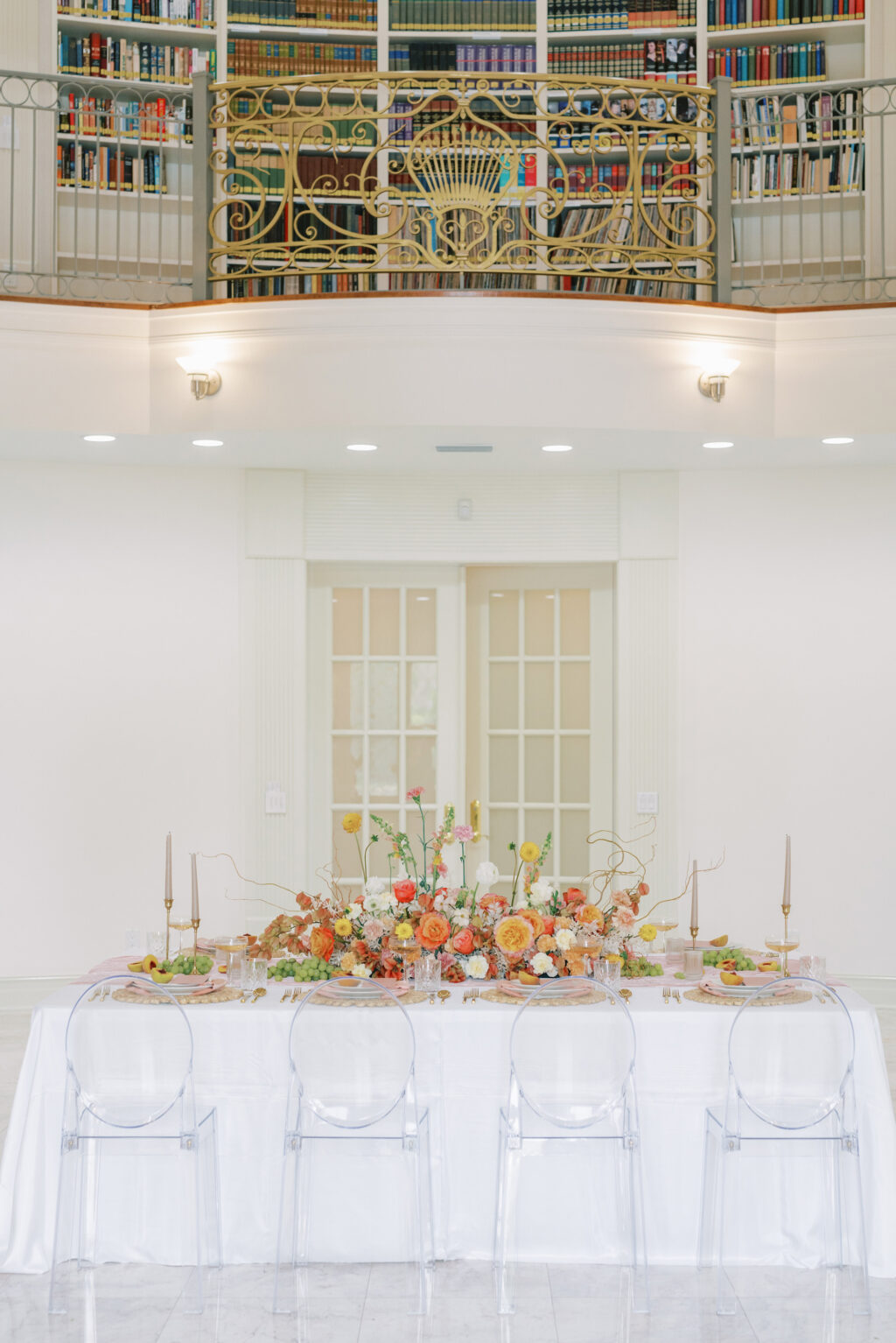 Romantic Modern Wedding Reception Ideas with Ghost Chairs and Peach Spring Floral Centerpieces | Neoclassical Architectural Tarpon Springs Wedding Venue Whitehurst Gallery