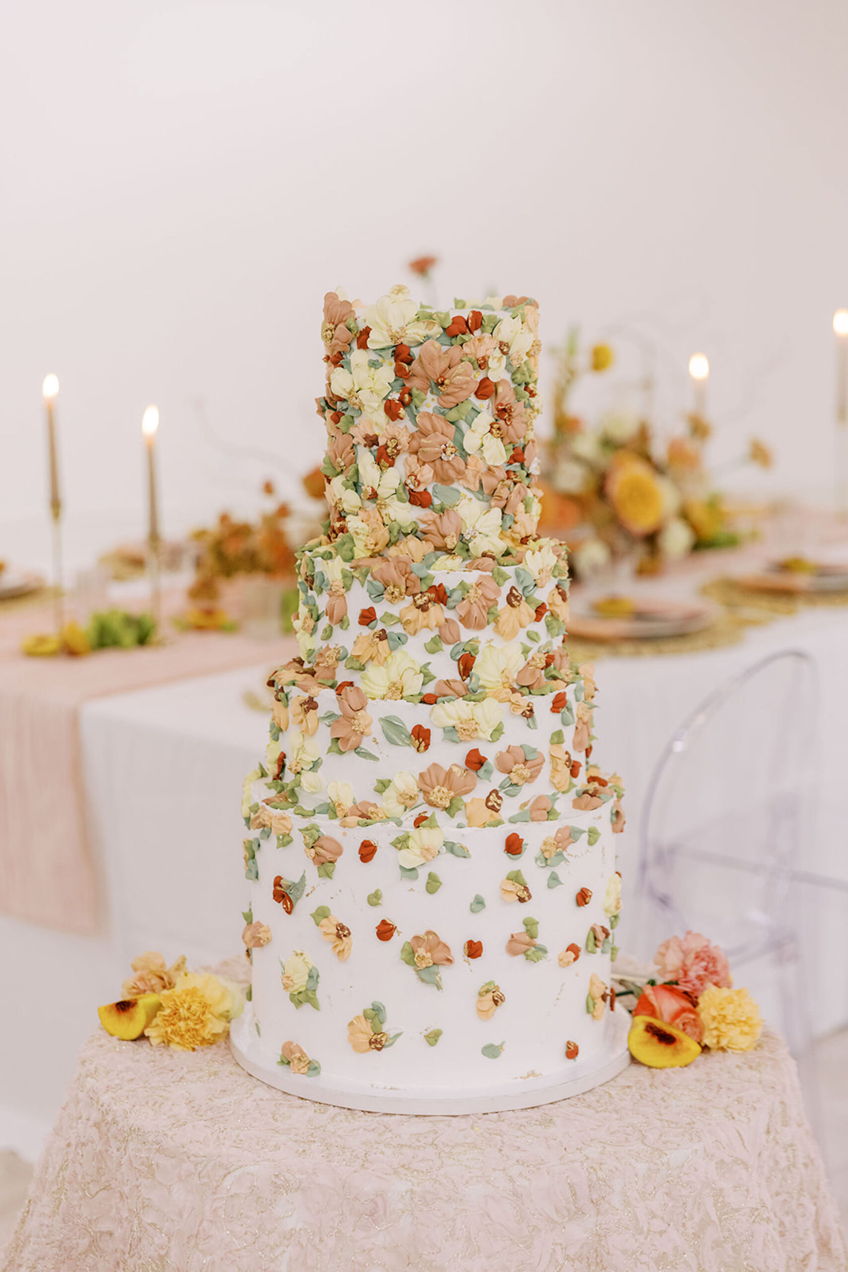 Four-tiered Wedding Cake with Green, Gold, Mauve, and Burnt Orange Hand-painted Leaves Spring Floral Wedding Cake Inspiration