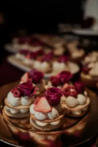 Specialty Macarons with Strawberry and Purple Roses Wedding Dessert Table Ideas
