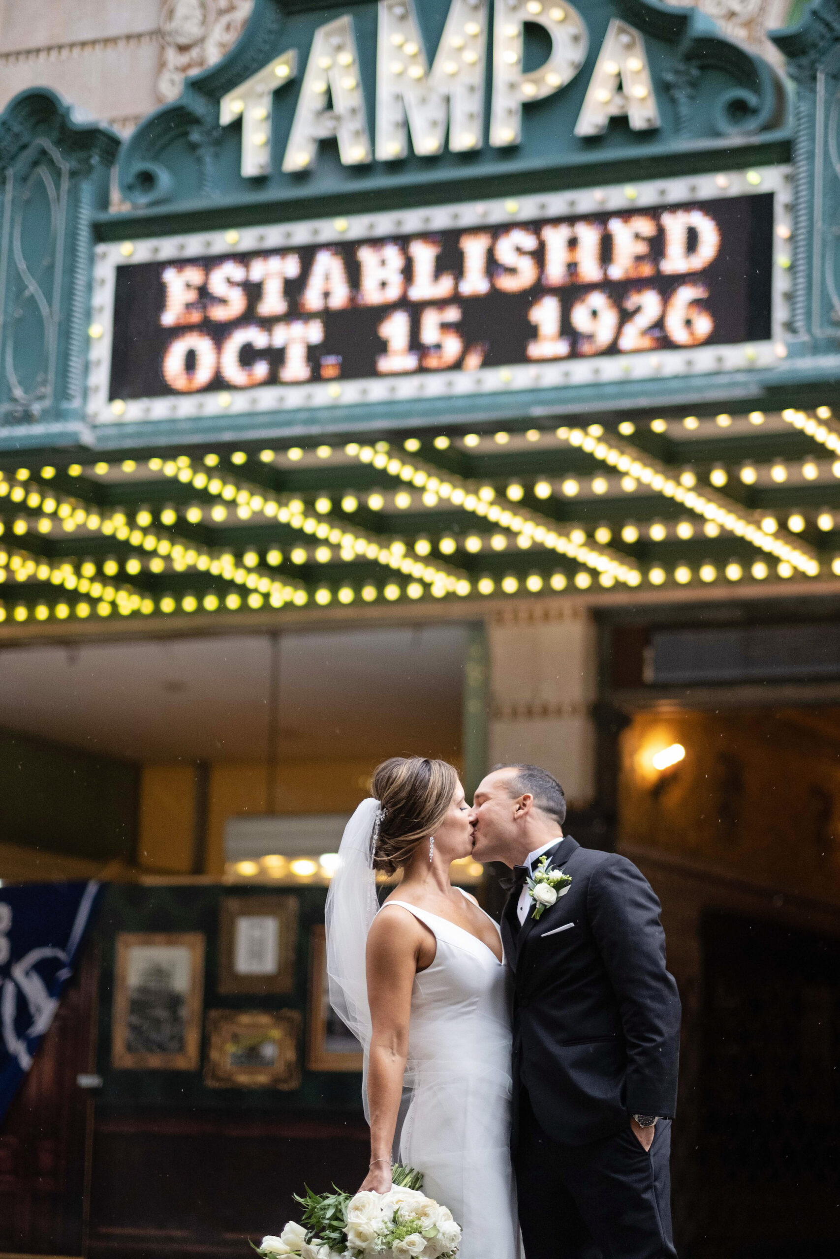 Bride and Groom Downtown Tampa Theatre Wedding Sign Portrait Ideas