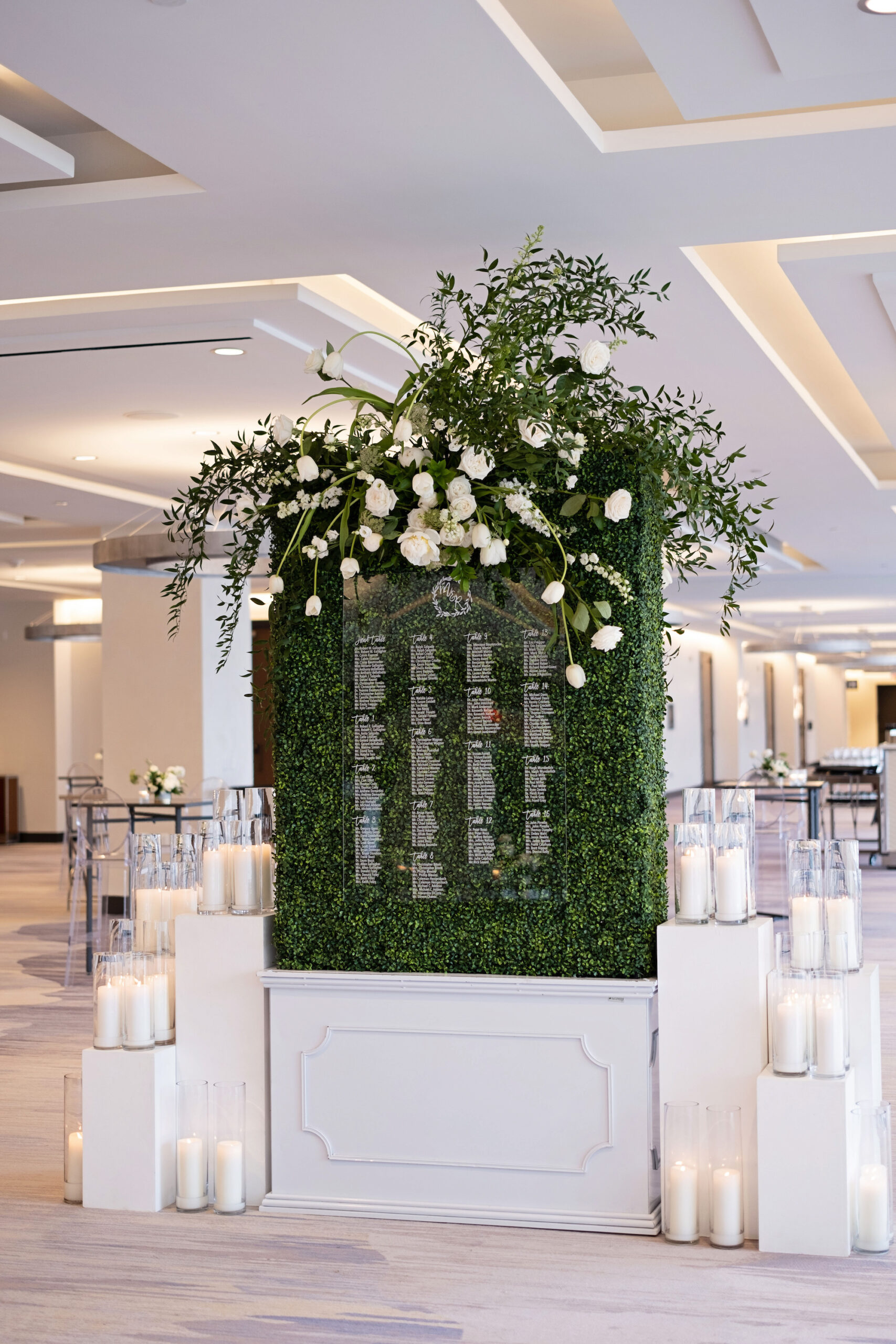 Greenery Backdrop with Acrylic Seating Chart and Candles Ideas | St. Pete Wedding Florist Bruce Wayne Florals