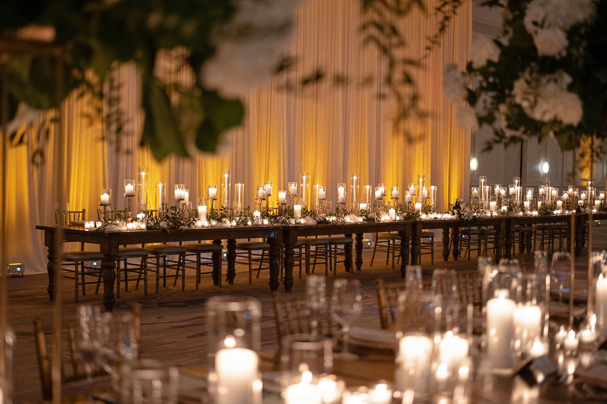 Long Feasting Tables | Whimsical Candlelit Centerpieces | Gold Chiavari Chairs | Tampa Bay Wedding Rental Company A Chair Affair