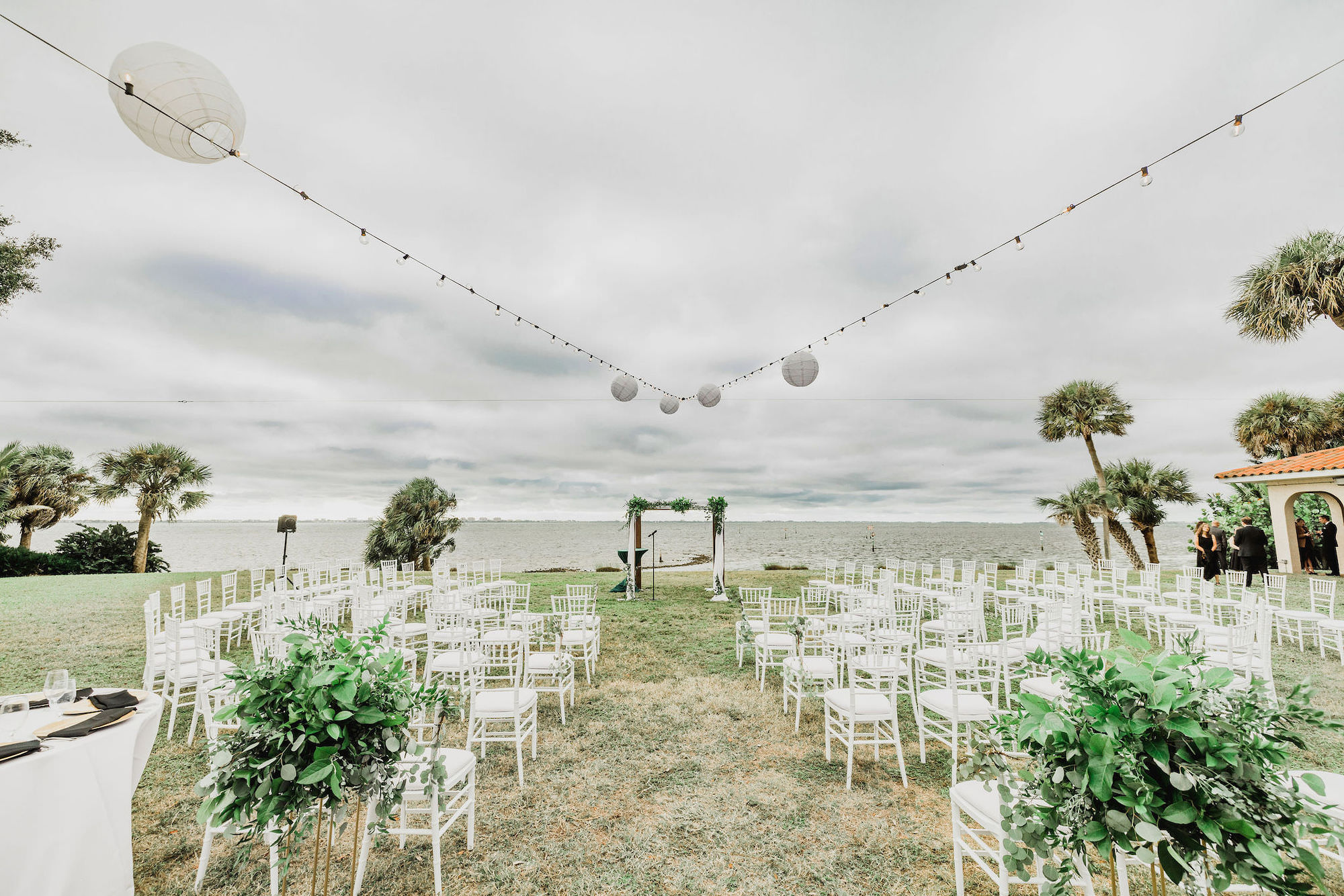 Unique Circular Wedding Ceremony Seating Ideas | White Chiavari Chairs | Outdoor Waterfront Sarasota Ceremony Venue Powel Crosley Estate