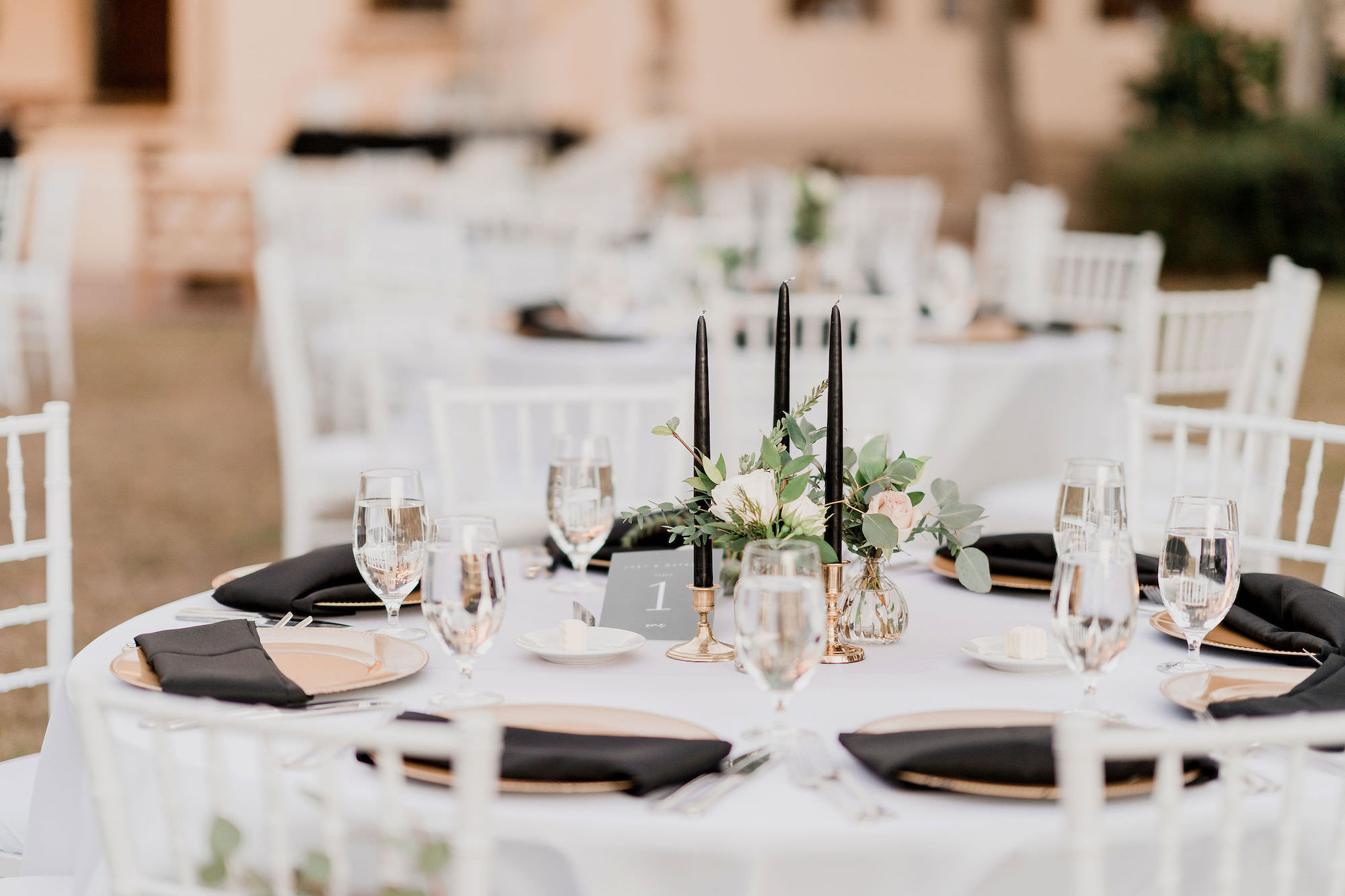 Modern Black Taper Candles and Napkins with Gold Holders, and Chargers Inspiration