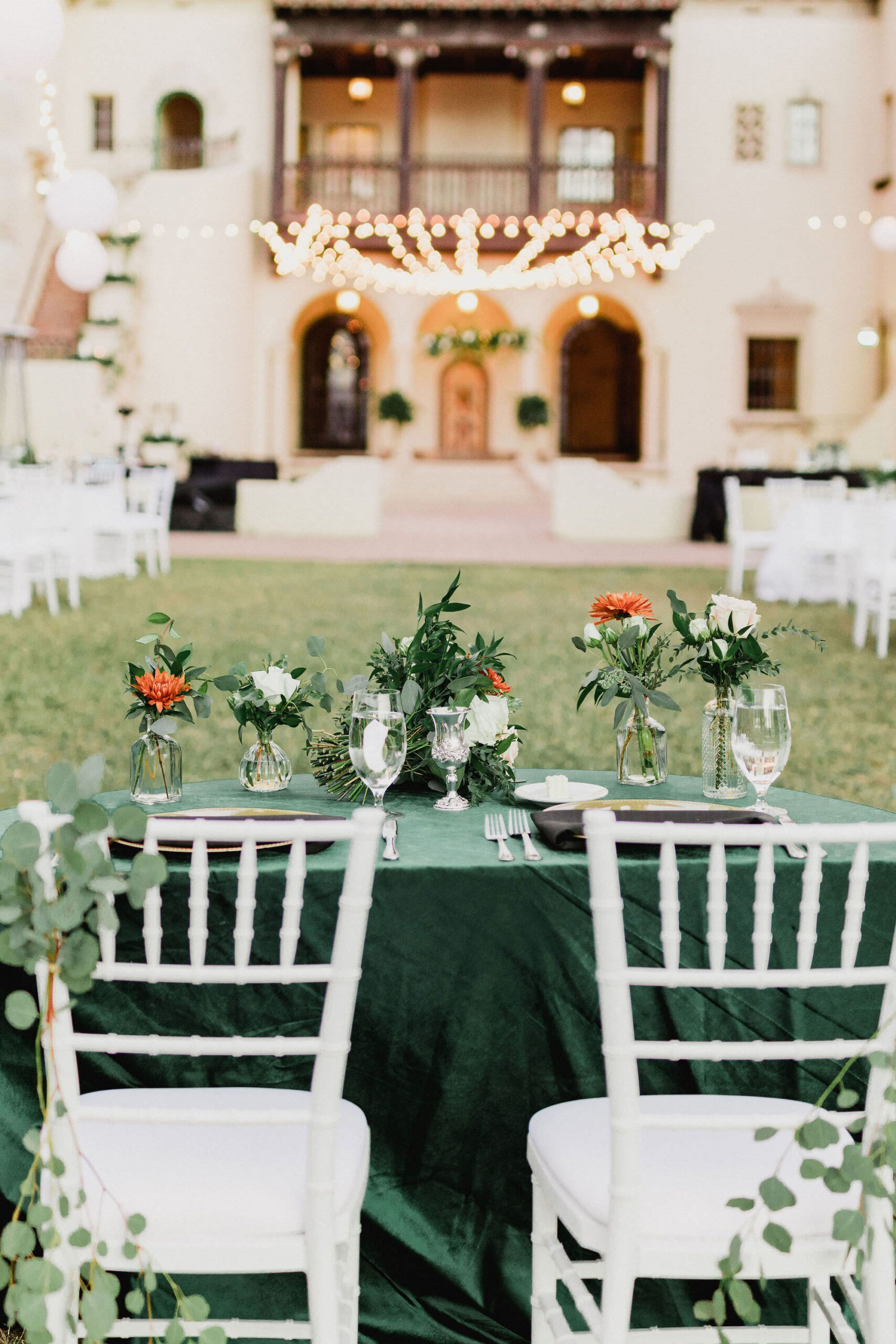 Dark Green Sweetheart Table | Orange Chrysanthemum and White Roses with Greenery Floral Centerpiece Arrangement Ideas