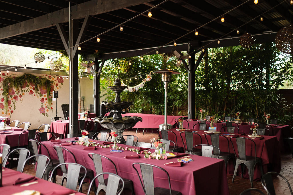 Outdoor Wedding Reception | Market Lights, Modern Metal Chairs | Burgundy Table Linens | Tampa Bay Over The Top Rental Linens
