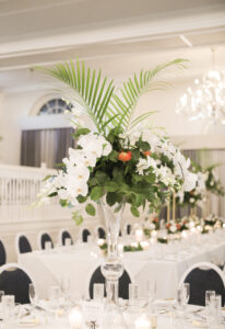 Tall Palm, White Orchid, Pin Cushion Protea, and Greenery Glass Vase Centerpieces
