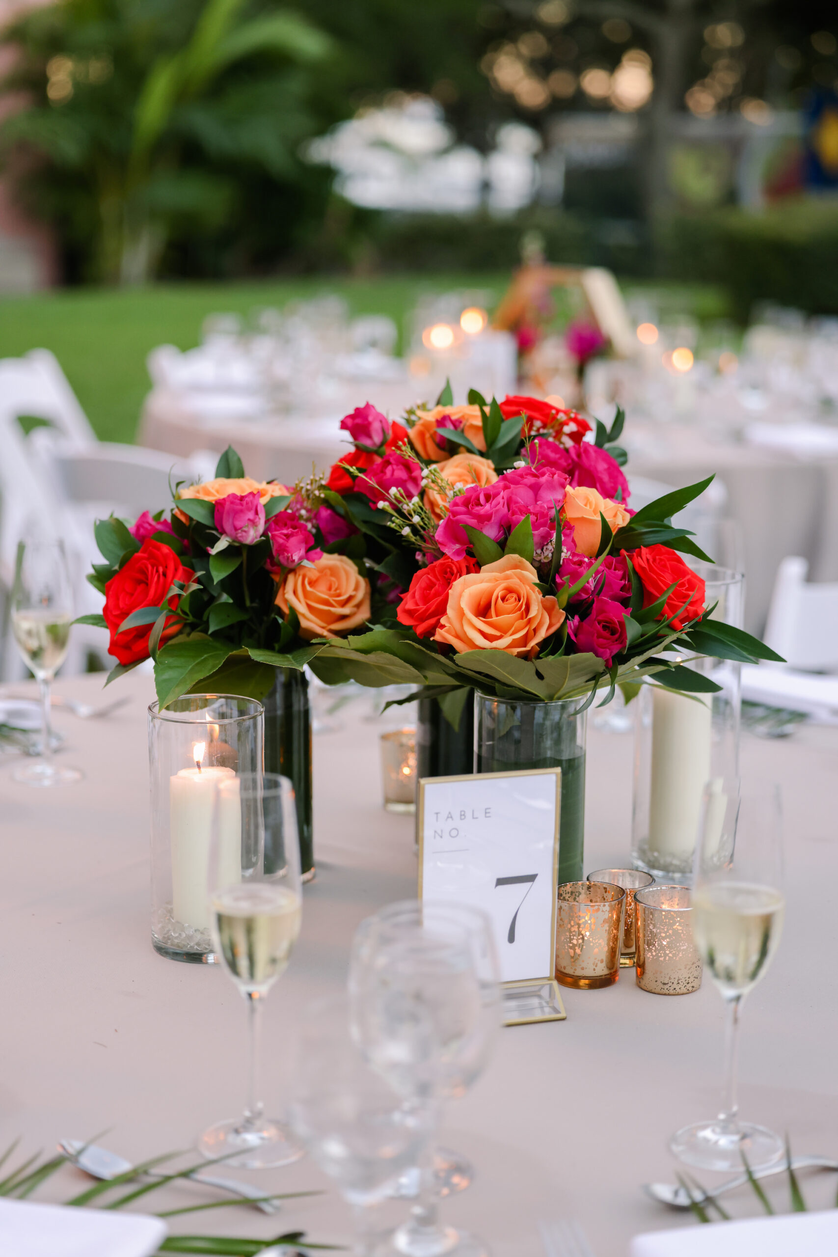 Pink, Orange, Red, and Ruscus Greenery Floral Centerpieces | Gold Frame Table Number