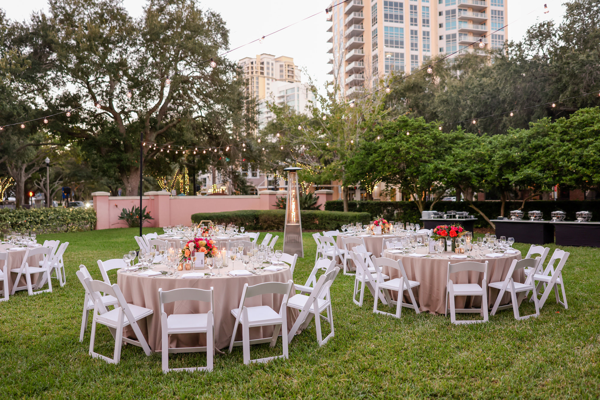 Outdoor Wedding Reception | Champagne Linen | White Folding Garden Chairs