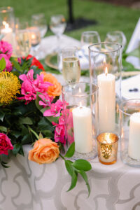 Candlelit Sweetheart Table with Champagne Linen and Tropical Flower Table Spray Ideas
