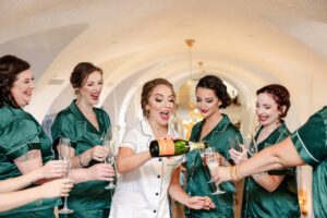 Green Satin Matching Bridesmaids Wedding Day Pajamas | White with Black Piping Monogram Bridal Pajamas | Tampa Bay Hair and Makeup Artist Femme Akoi Beauty Studio