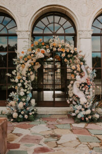 Garden Ombre Rainbow Floral Ceremony Arch for Italian Mansion Style Wedding Ceremony | Decor Inspiration