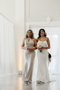 Bride and Mother Walking Down Wedding Aisle | Champagne Mother of the Bride Dress Inspiration