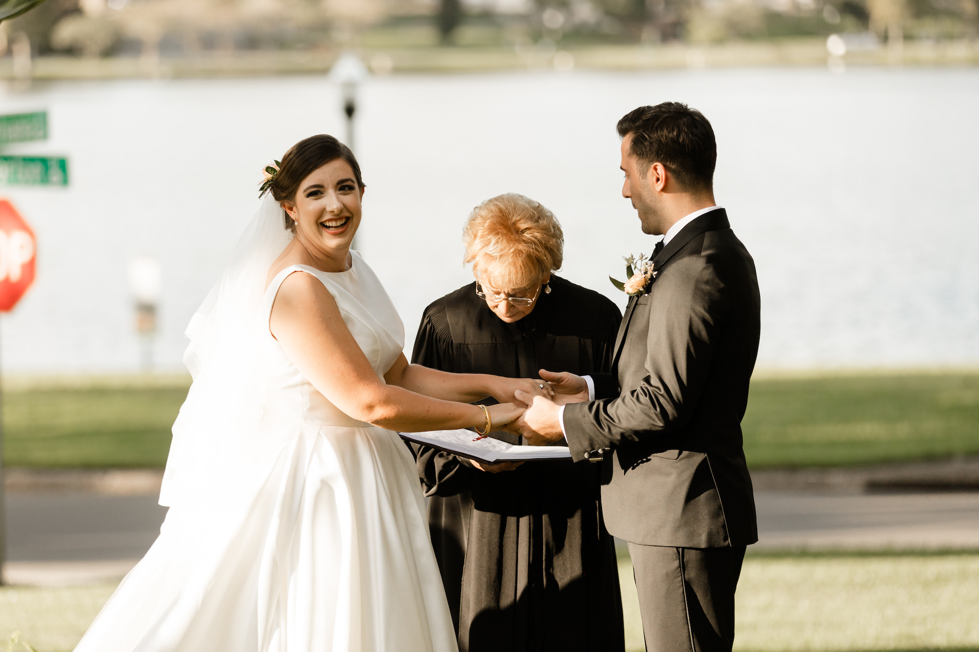 Bride and Groom Vow Reading | Lakeside Wedding Ceremony Ideas