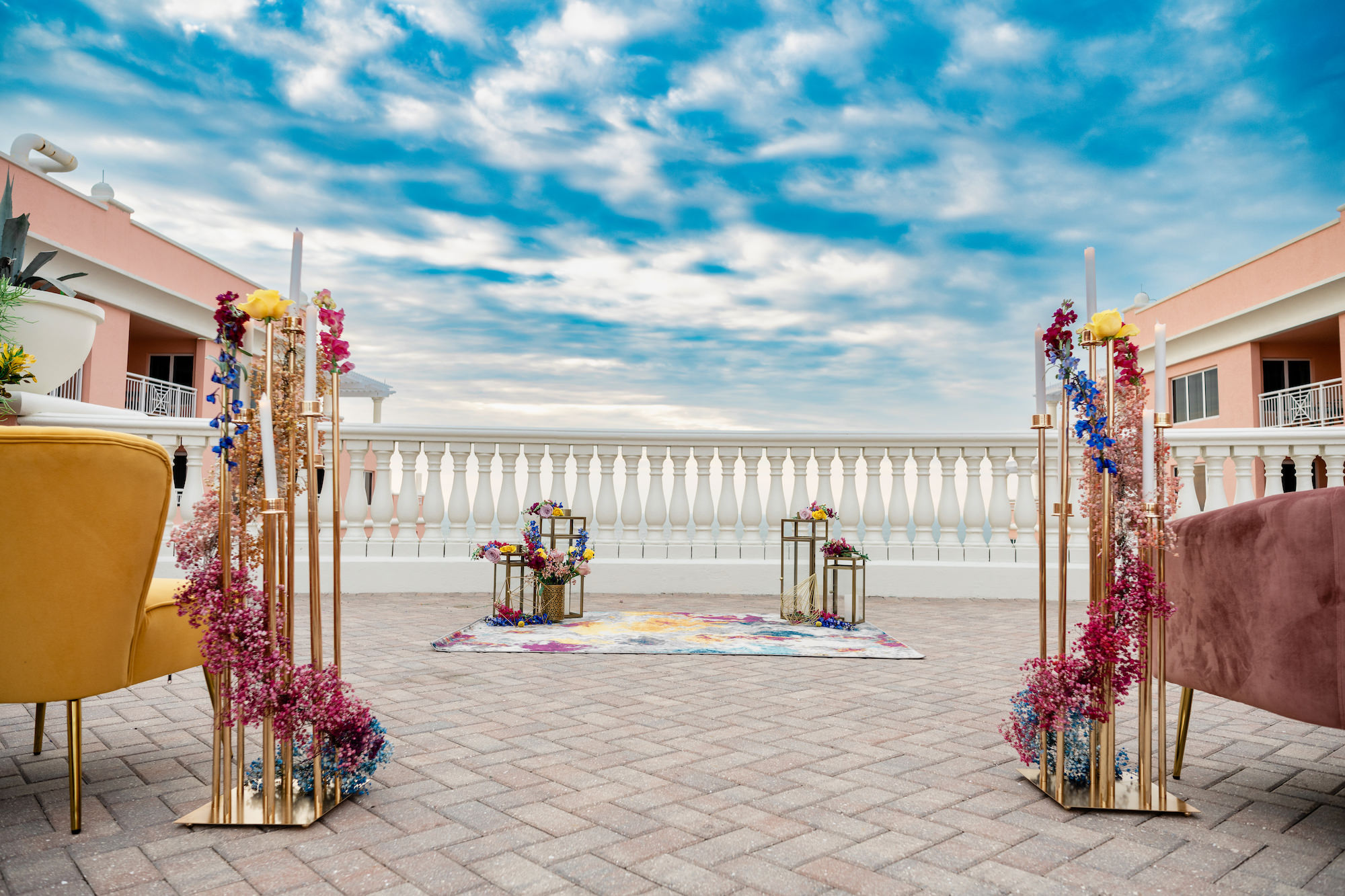 Vibrant Pink Baby's Breath, Blue and Red Snapdragon | Gold Cluster Taper Candle Holder Ceremony Aisle Decor | Tampa Bay Florist Save the Date Florida