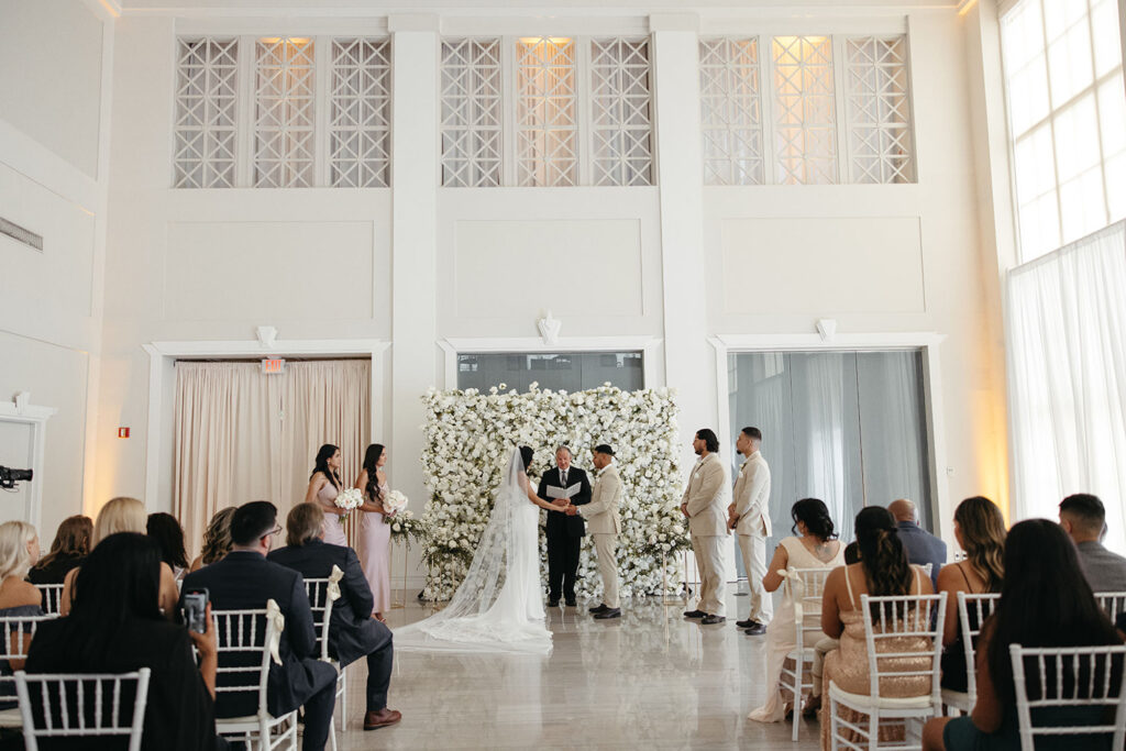 White Flower Ceremony Backdrop Wall Wedding Altar Ideas | Downtown Tampa Venue The Vault | Planner Coastal Coordinating