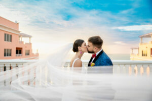 Bride and Groom Veil Wedding Portrait | Tampa Bay Photographer Iyrus Weddings | Venue Hyatt Clearwater Beach | Planner EventFull Weddings