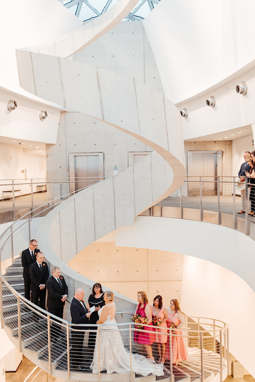 Wedding Ceremony on the Staircase | St Petersburg Venue Dali Museum | Planner UNIQUE Weddings & Events