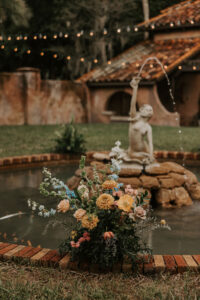 Italian Mansion Wedding Venue in Central Florida with Fountain and Rustic Florals