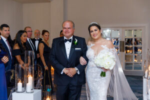 Bride and Father Walking Down Ceremony Wedding Aisle