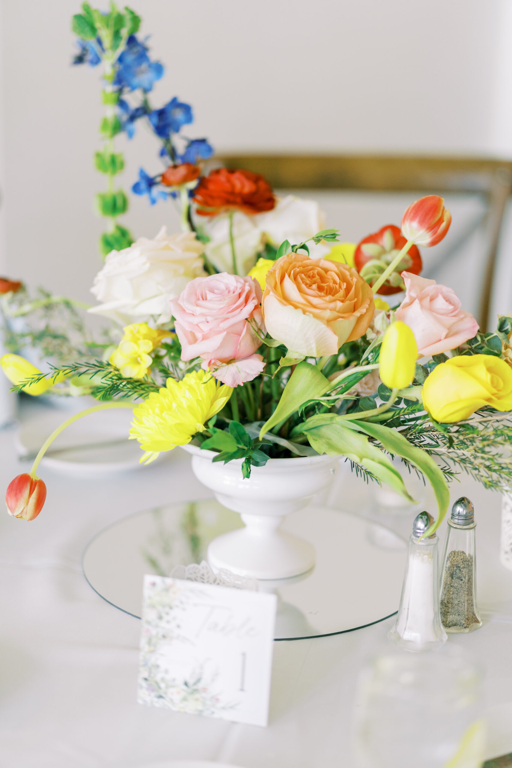 Orange, Yellow, and Pink Roses, Tulips, Blue Snapdragons | Spring Wedding Centerpiece Decor Ideas