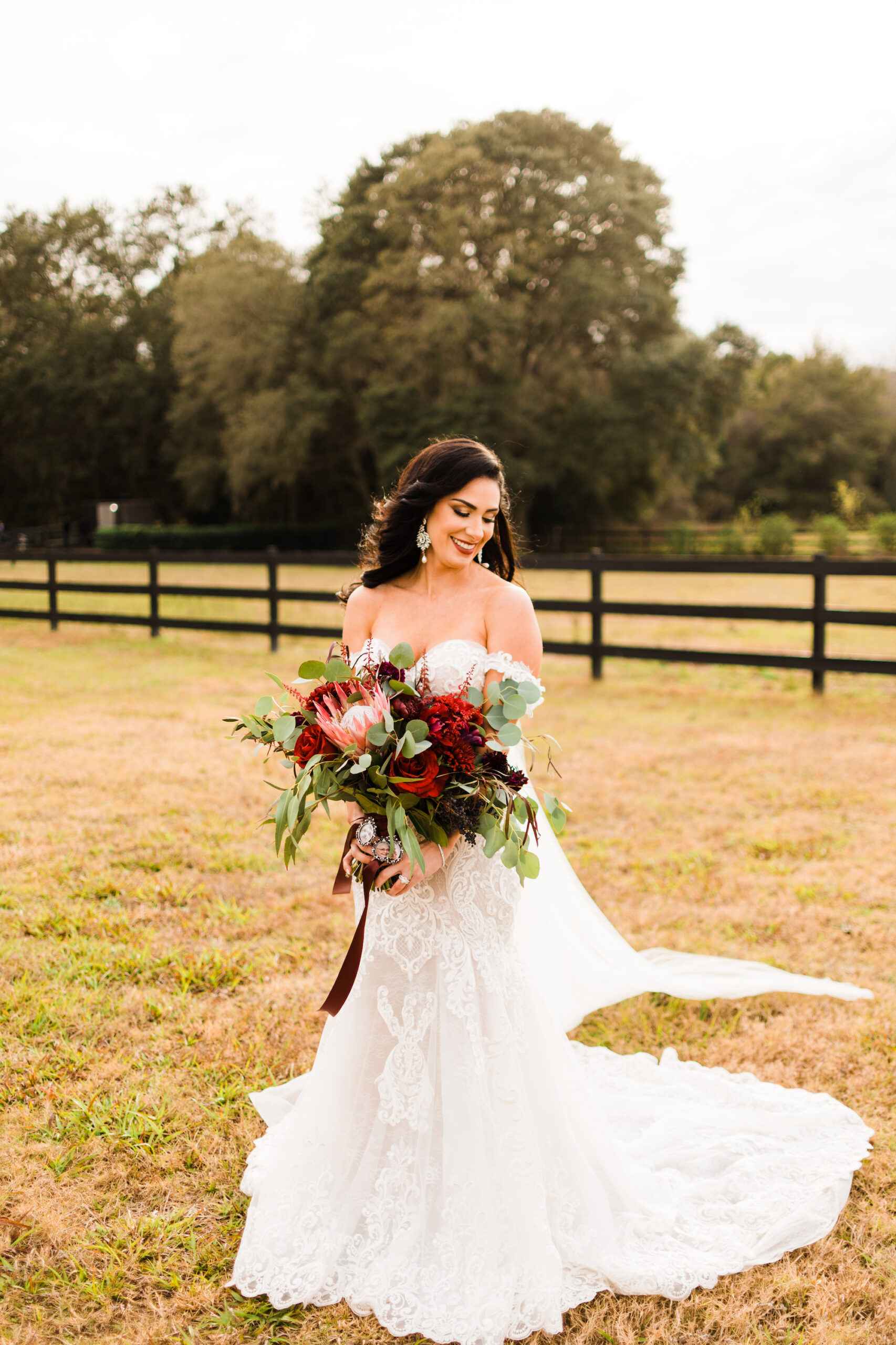 Burgundy Carnations, Roses, Crysanthemums, Pink King Protea Wedding Bouquet with Eucalyptus Greenery | Ivory Off-the-shoulder Lace Mermaid Wedding Gown Ideas | Brooksville Estate Venue Legacy Lane Weddings