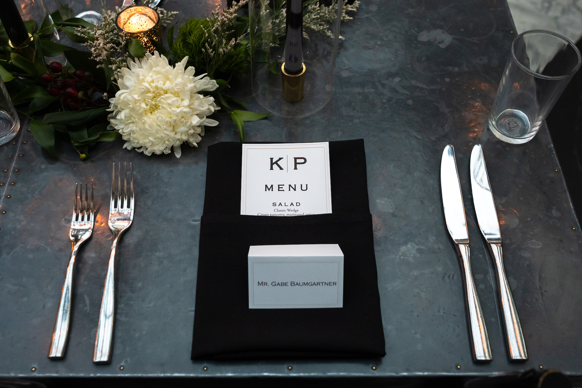 Black Napkins and Silver Flatware with Simple Modern Stationery at Place Setting Inspiration