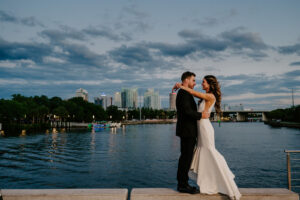 Bride and Groom Dock Sunset Wedding Portrait | Downtown Tampa Riverwalk
