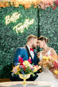 Better Together Neon Sign Greenery Backdrop | Colorful Wedding Inspiration | Clearwater Planner EventFull Weddings | Photographer Iyrus Weddings