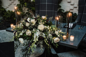 Sweetheart Table White Florals and Greenery Elegant Wedding Reception Decor with Black Candles Inspiration