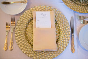 Wedding Reception Dinner Menu | Champagne Linen | Gold Chargers and Flatware Wedding Reception Decor Inspiration