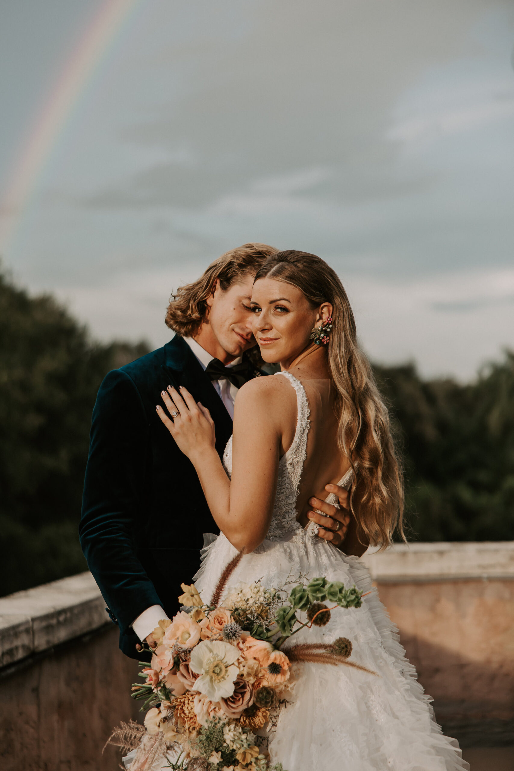Bridal Wedding Portrait of Bride and Groom Underneath Rainbow | Central Florida Venue Howey Mansion