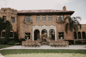 Wedding Ceremony at Italian Style Mansion with Rustic Boho Wooden Chairs | Central Florida Venue Howey Mansion
